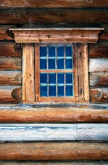 Old wooden window with wooden shutters