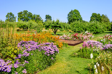 Fototapeta na wymiar Beautiful garden with flowers in Sagadi manor, Lahemaa national Park, Estonia