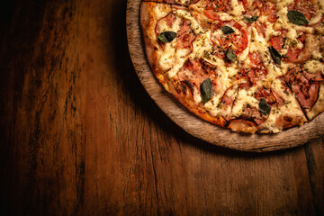 Delicious pizza in wood table
