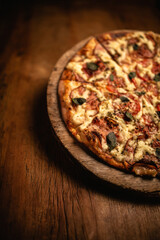 Delicious pizza in wood table