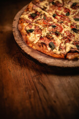 Delicious pizza in wood table