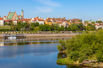 Panoramic view of Stare Miasto Old Town historic quarter with Wybrzerze Gdanskie embankment at Vistula river in Warsaw, Poland
