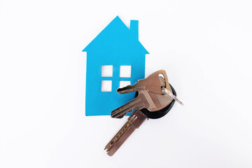 house with keys on a white background. home purchase and mortgage.