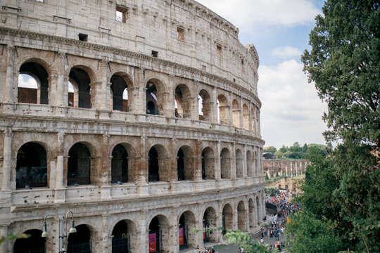 view of the roman coliseum on a hot summer day in the tourist season