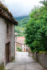 Fototapeta na wymiar Pineda de la Sierra. Mountain village in Spain. Very traditional town in the province of Burgos in Castilla y León, with stone houses in the Sierra de la Demanda.
