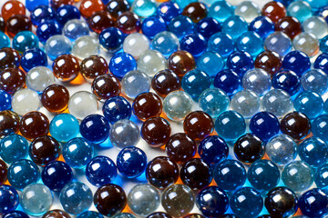 A lot of multi-colored glass balls. Can be used as background.