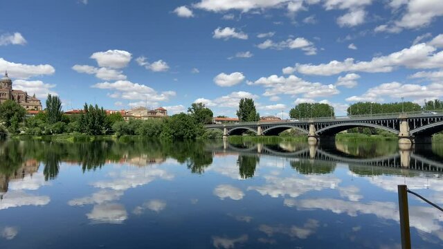 Salamanca Old and New Cathedrals reflected on Tormes River