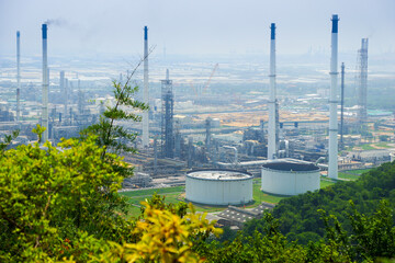 petrochemical plant view behind the hill