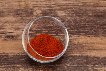 Dry paprika powder in the bowl