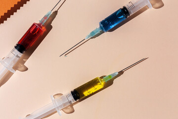 Covid-19- Vaccine vial dose against coronavirus needle syringe, medical concept vaccination