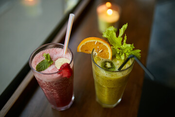 Refreshing cocktails and smoothies. Summer mood. Cocktail close-up with fresh fruits and berries.