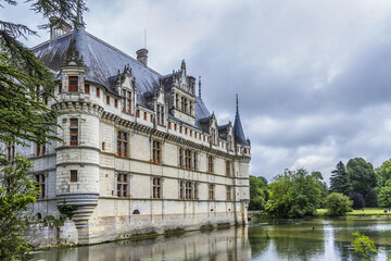 Fototapeta na wymiar Chateau of Azay-le-Rideau was built from 1515 to 1527 - one of earliest French Renaissance chateaux. Island in Indre River, its foundations rise straight out of water.