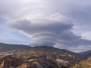 mountainous landscape and cloudy sky in the towns of Sierra Nevada (Spain)

