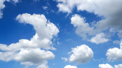 Naklejka na ściany i meble White clouds floating on blue sky for backgrounds concept.