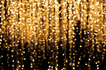 Christmas lights hanging in a row in a living room