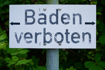 German sign with the words -bathing forbidden-