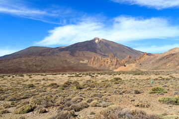 Fototapeta na wymiar Volcano Mount Teide peak and rock formations Roques de Garcia in Teide National Park on Canary Island Tenerife, Spain