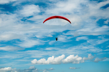 Paraglide in a blue sky
