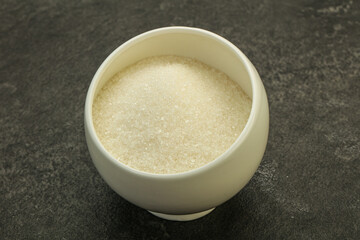 White sugar in the bowl