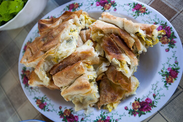 Traditional rustic handmade pie with cheese