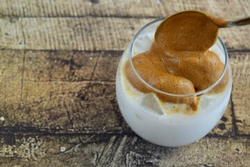 Iced Dalgona Coffee. Trend Korean Drink Creamy Whipped Iced Coffee