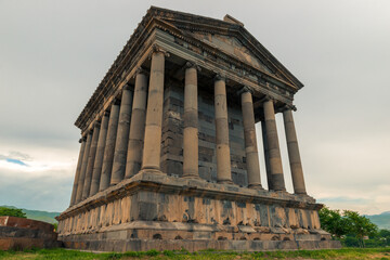 Fototapeta na wymiar colonnade of the beautiful Garni temple in the mountains of Armenia, a landmark of the country