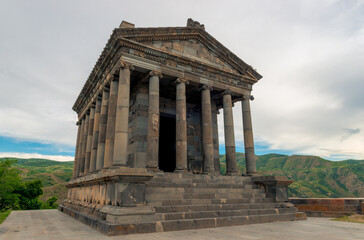 Fototapeta na wymiar The pagan ancient temple of Garni in the mountains of Armenia, a landmark of the country