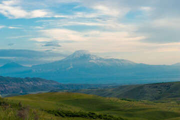 Fototapeta na wymiar beautiful picturesque evening landscape of Armenia - Mount Big Ararat with a snow-capped peak