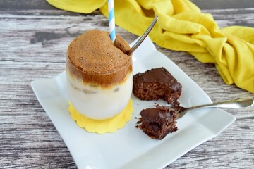 dalgona coffee, fluffy creamy whipped coffee, served with brownie