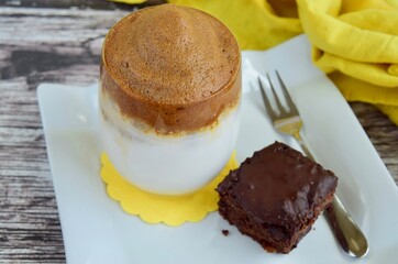 dalgona coffee, fluffy creamy whipped coffee, served with brownie