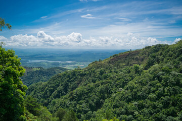 Majestic panorama of green mountains with clouds