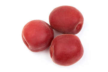 Sweet juicy red apricots, ripe nectarines, isolated on white background