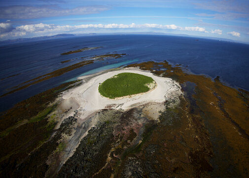 Aerial view of green island in the Breiafj&circ;rur bay in west Iceland
