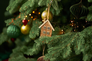 Christmas tree decorated with glass toys. Gifts under the Christmas tree. Christmas tree. Gifts in a box.