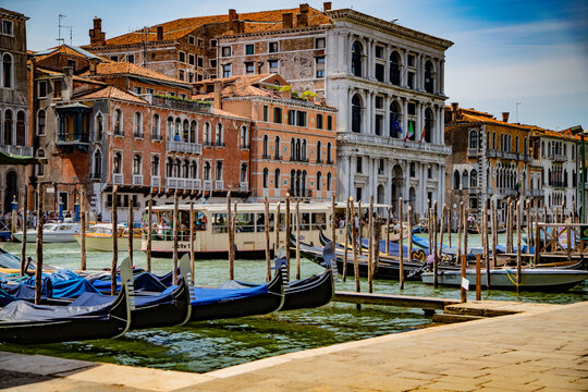 Vaporetto (water bus) and gandolas on the Grand Canal in Venice . Italy. September 2019.