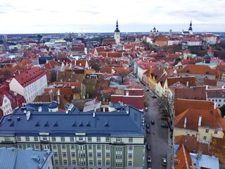Fototapeta na wymiar View of the roofs of the old city of Tallinn and the seaport from a high tower