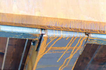 Iron, detail of a steel and iron structure that has rusted. Rust, drip is the cause of iron oxidizing in contact with atmospheric agents.