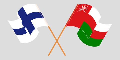 Crossed flags of Oman and Finland