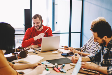 Skilled group of employees team working on business strategy share ideas and talking .