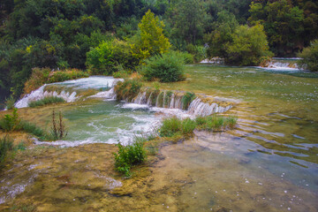Obraz premium Krka National Park. Waterfall and wild landscape at famous tourist attraction in Croatia