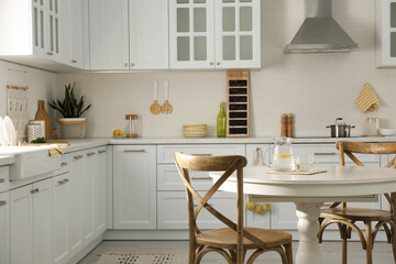 Elegant kitchen interior design with white round table