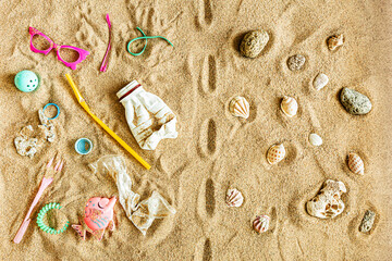 Fototapeta na wymiar Trash (garbage) on the beach. Ecological crisis - plastic pollution.