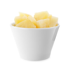 Pieces of delicious canned pineapple in bowl on white background