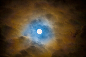 Naklejka na ściany i meble moon between clouds