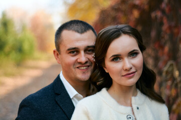 Obraz premium Couple in love close-up portrait. Concept of happy family. Modern family outdoor.