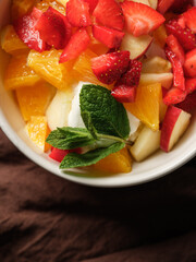 Top view dessert fruits and ice cream cooking homemade with summer fruits assorted on table background.