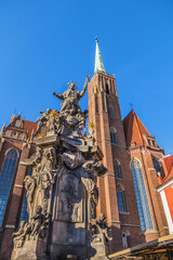 View of Collegiate Church of the Holy Cross and St. Bartholomew in Wrocław. Gothic church located...