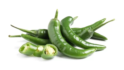 Fotobehang Chili Pepers Cut and whole green hot chili peppers on white background  © New Africa