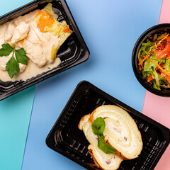Mockup. Healthy tasty food in plastic containers on colored backgrounds