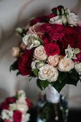 A beautiful stylish bouquet stands on the table close-up